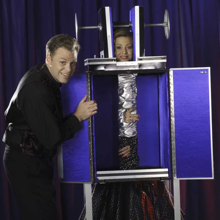 Brock Edwards and his assistant performing the Twister grand illusion